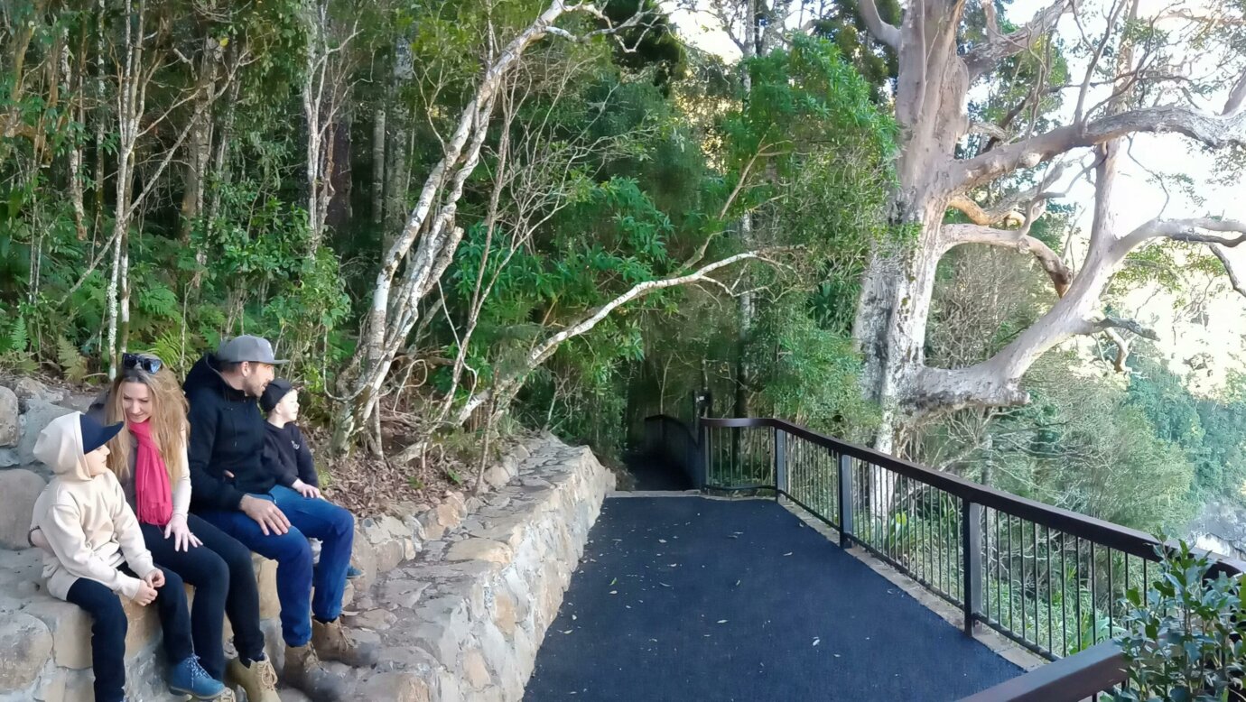 A family enjoys the view from Morans Falls lookout