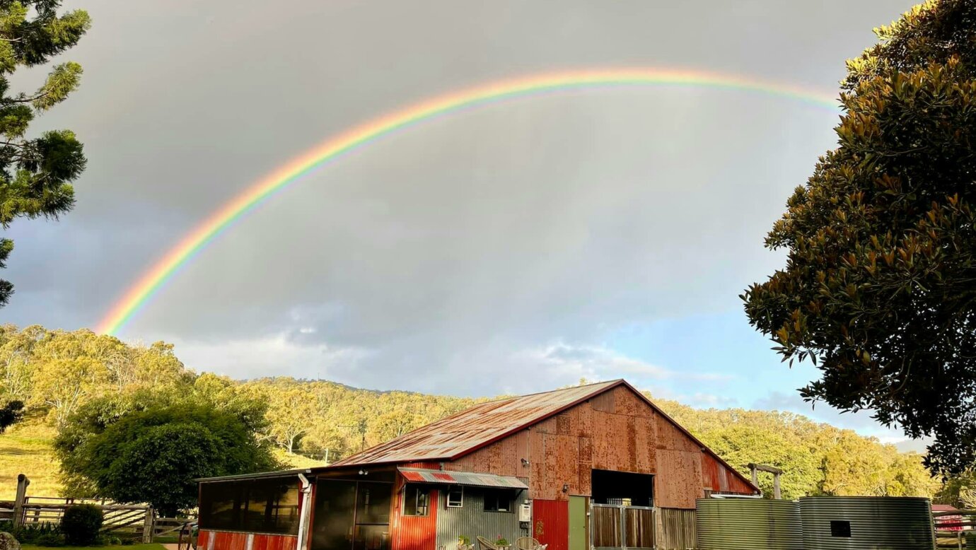 Cabin with rainbow